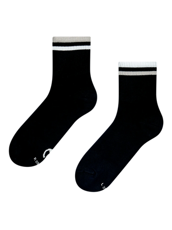 Chaussettes mi-mollet à rayures noires et blanches
