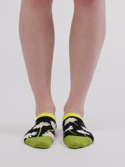 Socquettes rigolotes pour baskets Marguerites durant la nuit